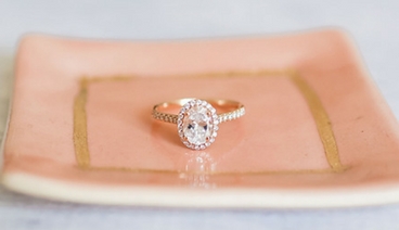 Graduated pave halo engagement ring in Rose Gold