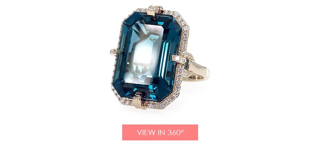 18K Yellow Gold East-West Emerald Shaped Blue Topaz And Pavé Diamond Halo Split Shank Ring