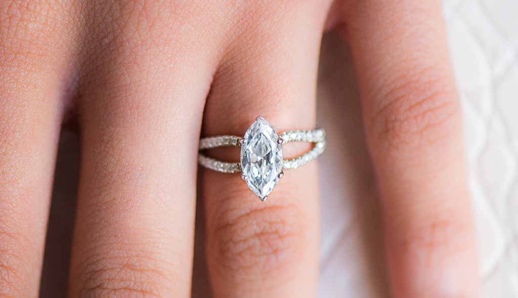 marquise-cut-diamonds-cover-split-shank-ribbon-engagement-ring