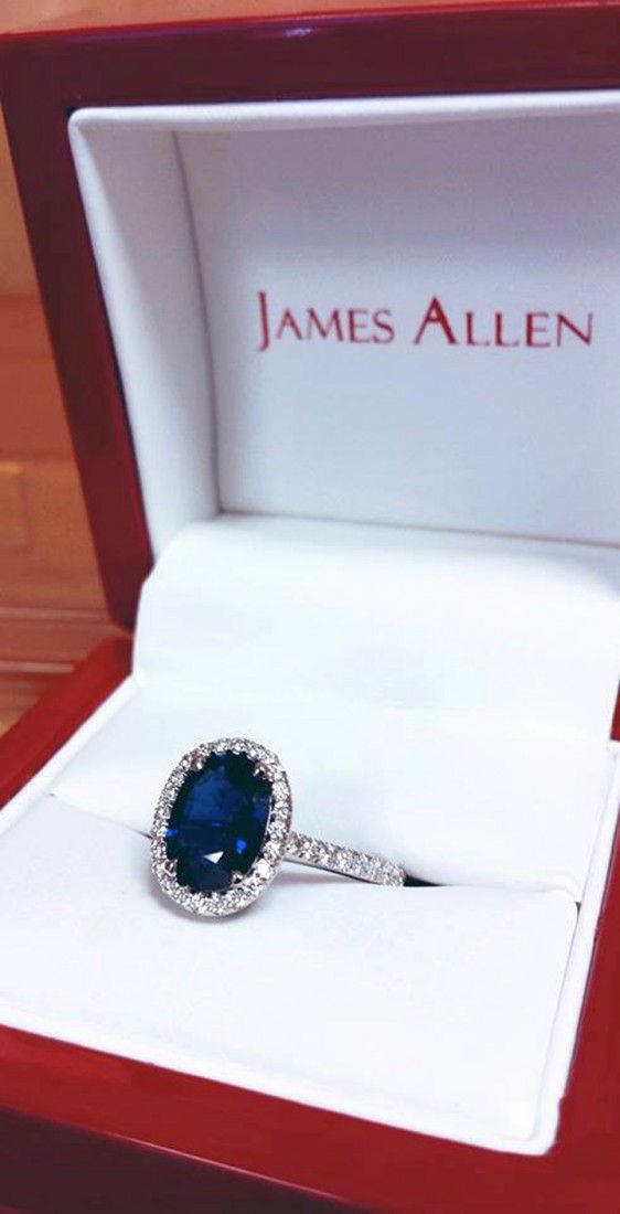 Sapphire engagement ring with diamond halo