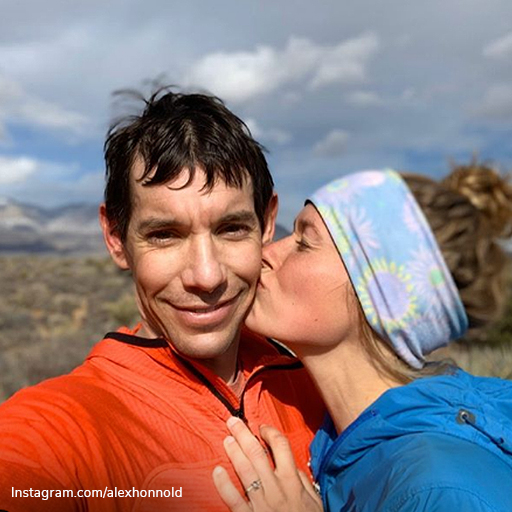 Celebrity engagement rings: Sanni McCandless wearing her engagement ring as she kisses Alex Honnold on the cheek.