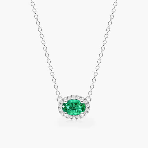East West Set Oval Halo Emerald And Diamond Necklace