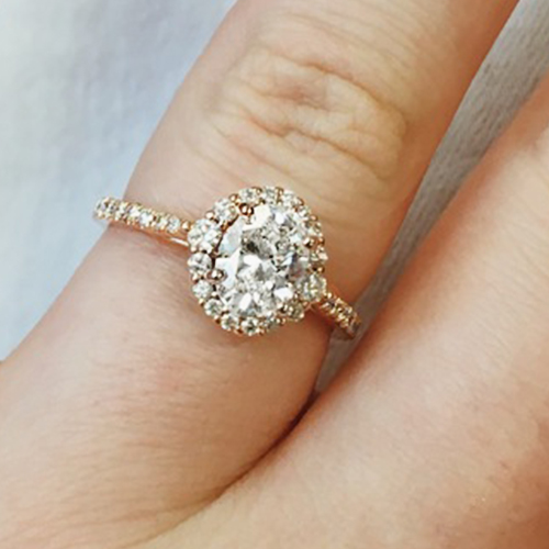 most popular engagement rings: rose gold pave halo engagement ring