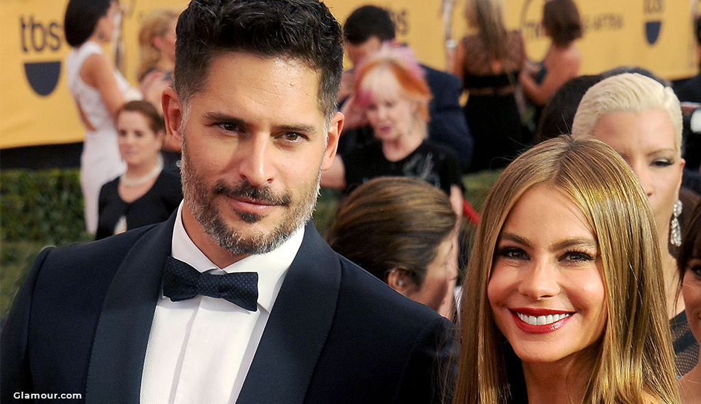 Sofia Vergara smiling with her husband Joe on the red carpet. 