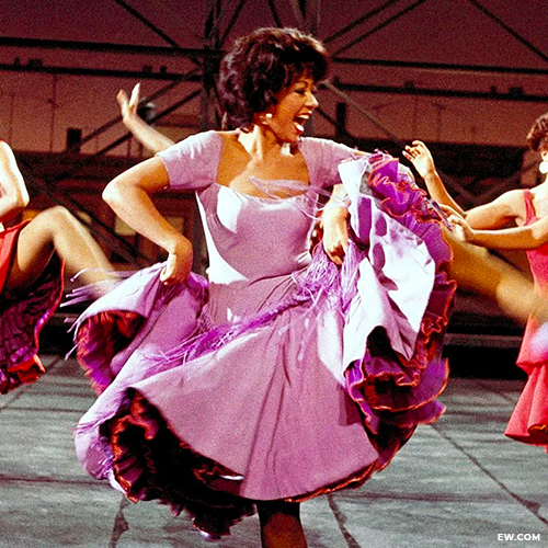 Anita in the 1961 movie, dances in her purple mermaid dress 