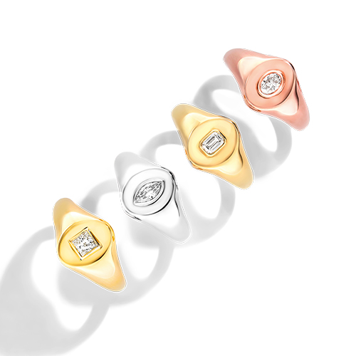 A variety of different gold and diamond signet rings 