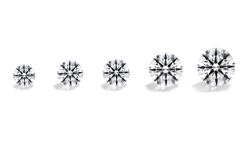 A row of different shaped round cut lab created diamonds 