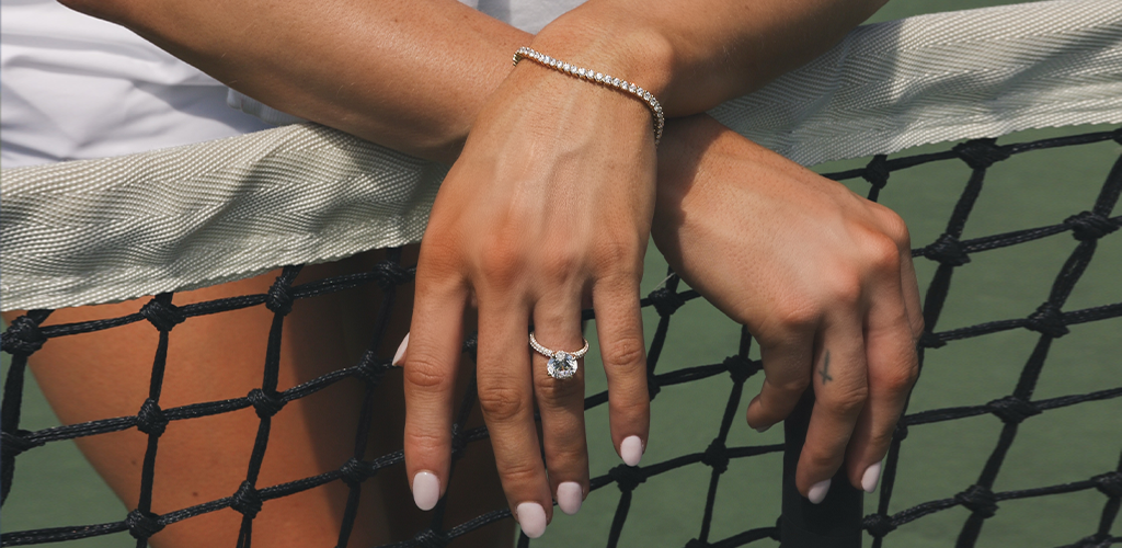 white gold diamond tennis bracelet and pave band round diamond engagement ring