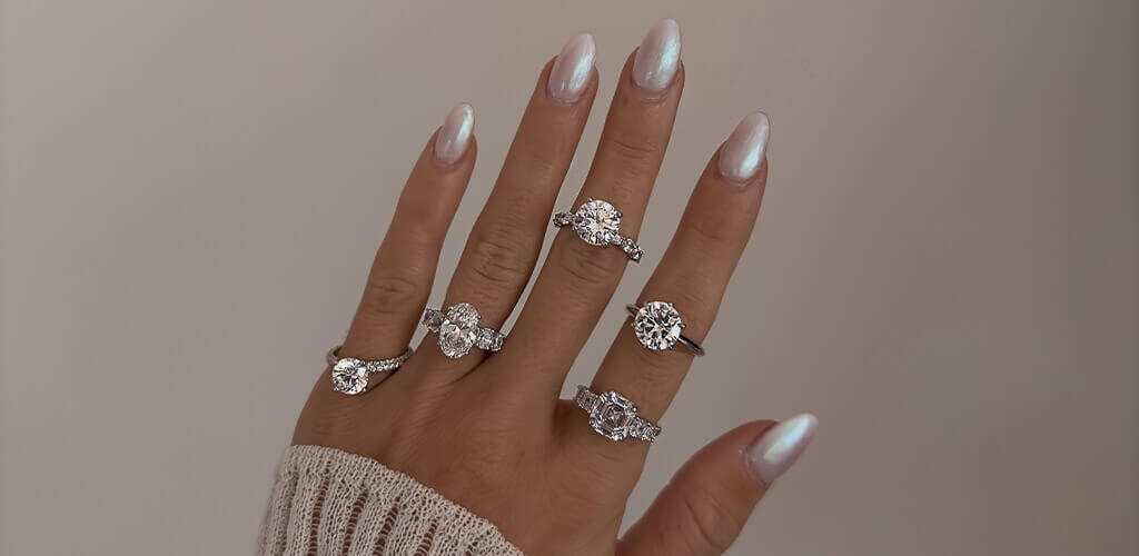 hand with multiple engagement rings