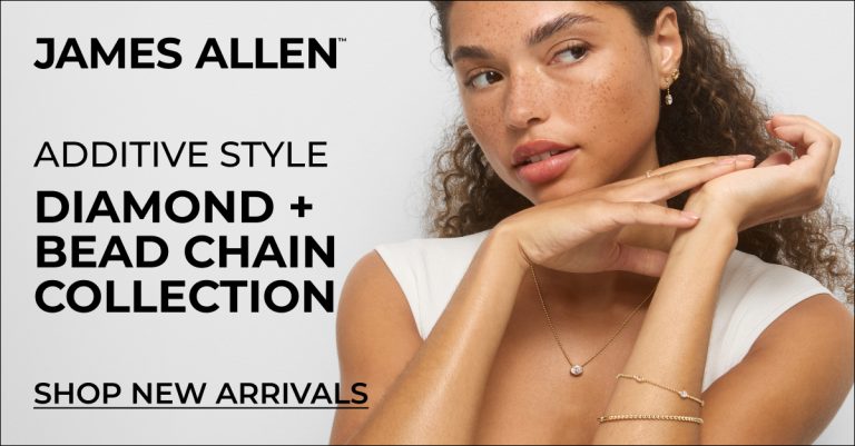 Woman wearing bead chain and diamond jewelry
