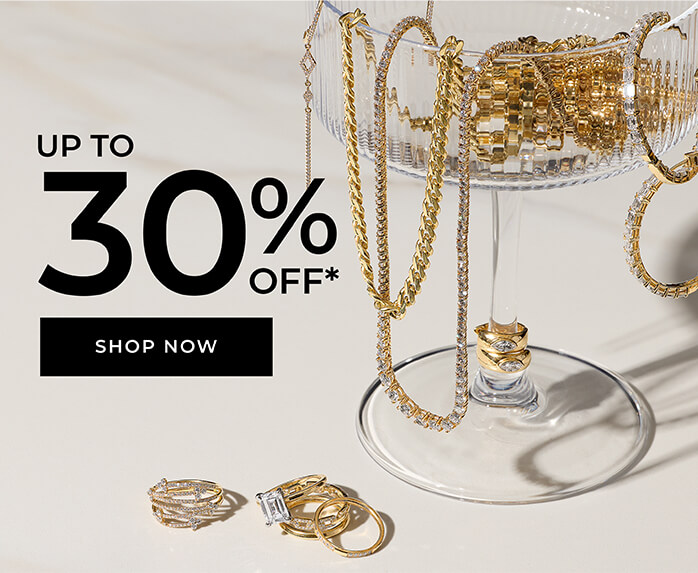 gold jewelry in a glass