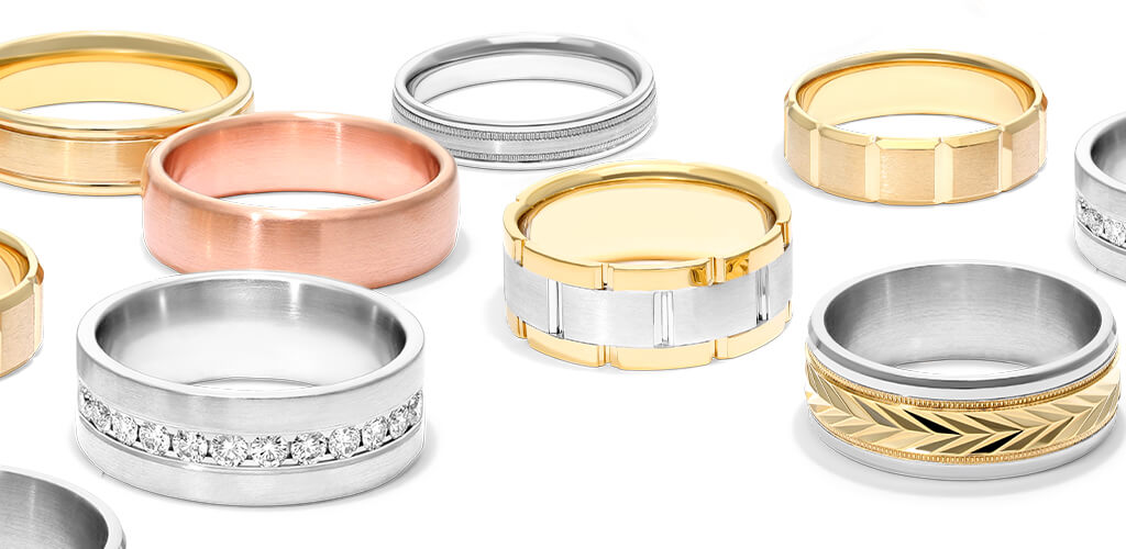 Seven different men's engagement rings