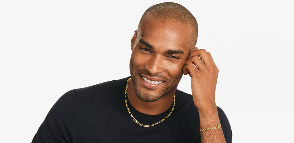 A Model Wearing A Yellow Gold Chain