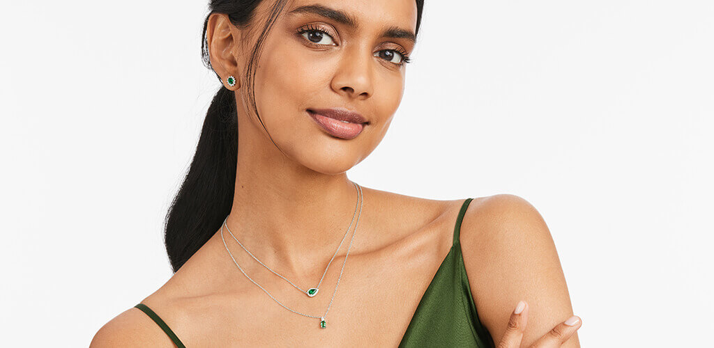 Model Wearing Emerald Jewelry 1