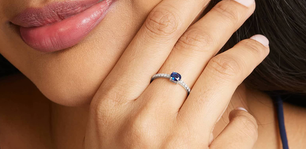 A model shows off sapphire piece from James Allen